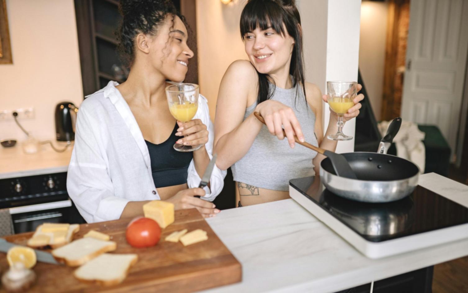 Colorful fresh vegetables and plant-based cooking ingredients arranged on a kitchen counter